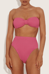Ruby Bikini Candy Pink by Hunza G, crinkle bikini with bandeau top and high waist fit. Perfect for beach days or playful swim looks.