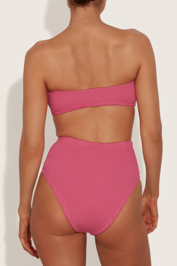 Ruby Bikini Candy Pink by Hunza G, crinkle bikini with bandeau top and high waist fit. Perfect for beach days or playful swim looks.