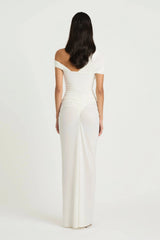 Rumi Maxi Dress by Benni — an asymmetric stretch jersey dress with a gathered skirt and cascading split, perfect for elevated evenings.