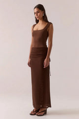 Ryen Dress Brownie by Sovere – dropped waist maxi dress with mesh skirt and square neckline.