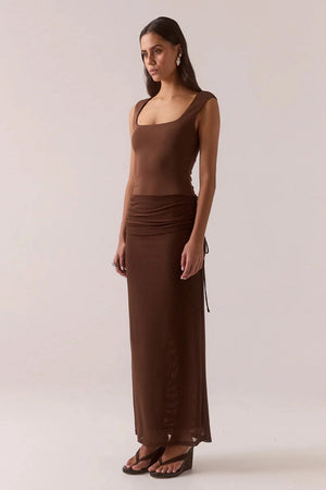 Ryen Dress Brownie by Sovere – dropped waist maxi dress with mesh skirt and square neckline.