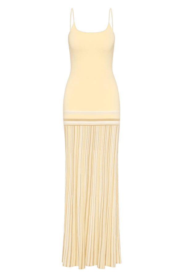 Citara Maxi Dress Butter Stripe by Faithfull the Brand – Trendy ribbed knit maxi with adjustable straps and backless tie, perfect for effortless summer elegance and beach days.