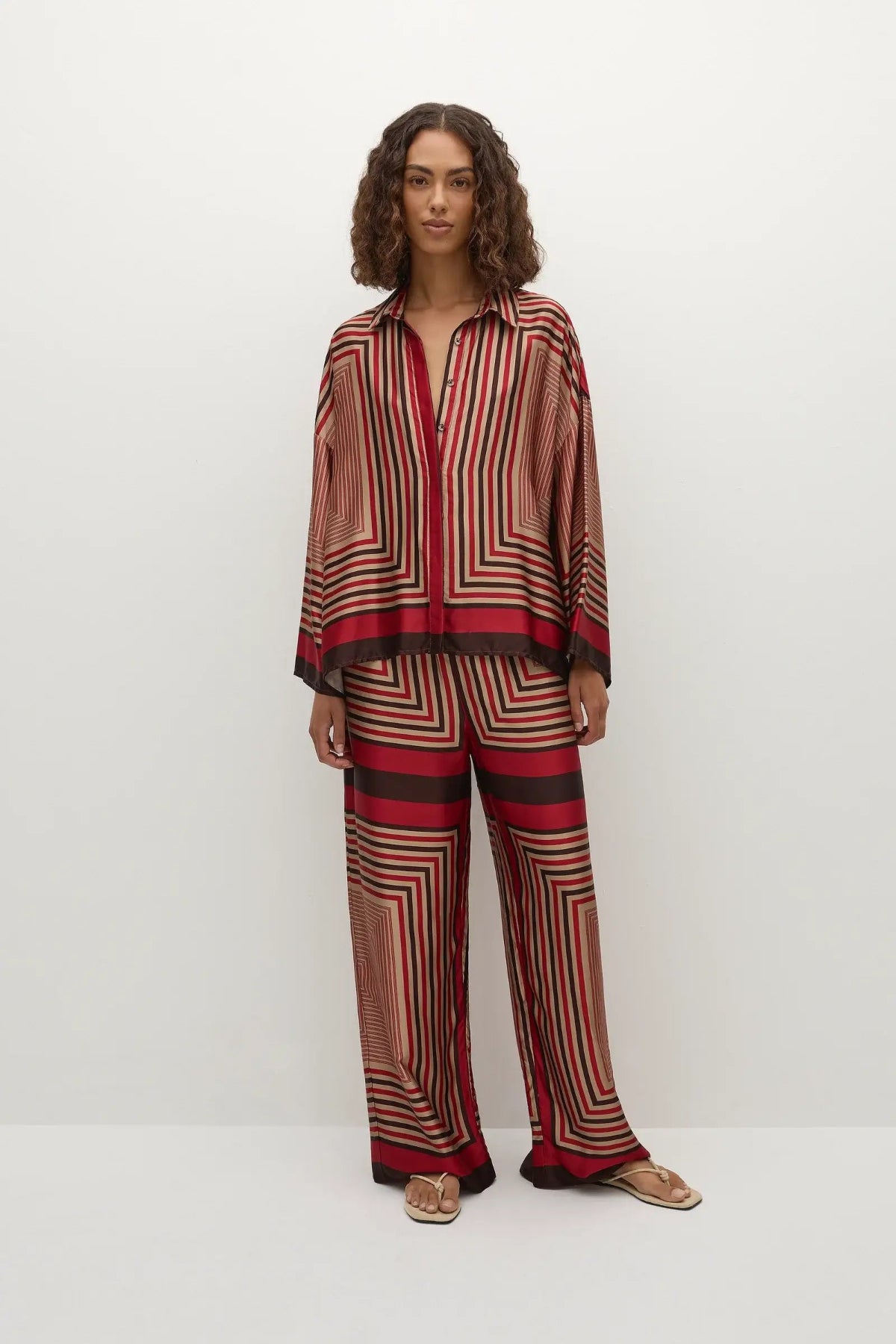 Faithfull the Brand Ylva Pant in Ylva Print, mid-rise straight leg with elastic waist in red-brown stripe. Perfect for chic co-ord styling.