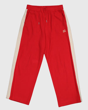 Red Knitted Baggy Pants by Something Very Special, featuring stripe jacquard and tonal embroidery. Unisex fit for everyday comfort.