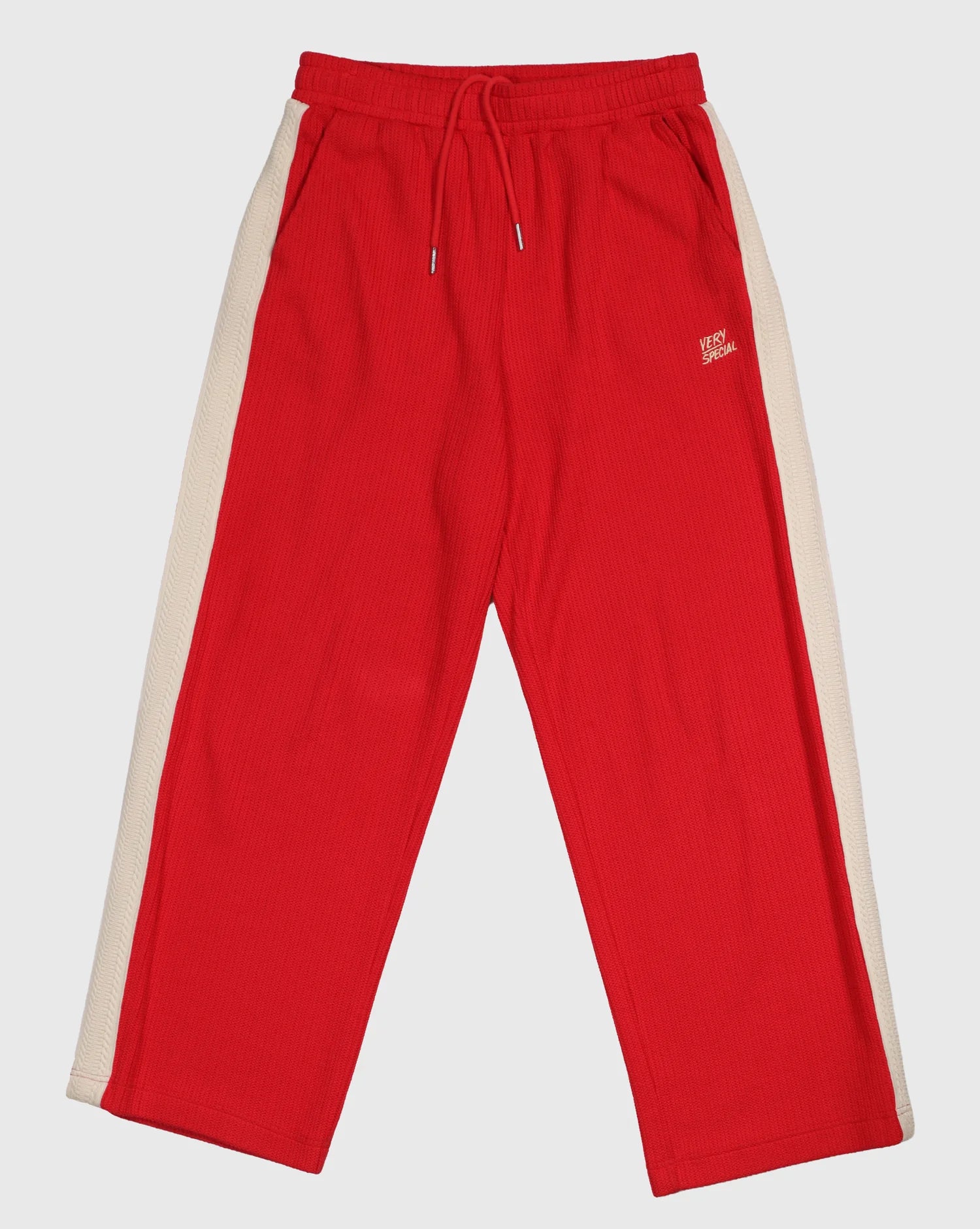 Red Knitted Baggy Pants by Something Very Special, featuring stripe jacquard and tonal embroidery. Unisex fit for everyday comfort.