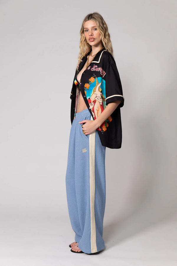 Steel Blue Knitted Baggy Pants by Something Very Special, featuring stripe jacquard and tonal embroidery. Unisex comfort redefined.