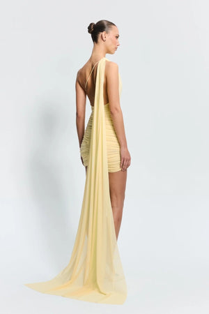 Sabine Mini Lemon by Effie Kats, a sculpted stretch mesh mini with sheer texture. Perfect for rooftop parties or warm summer nights.