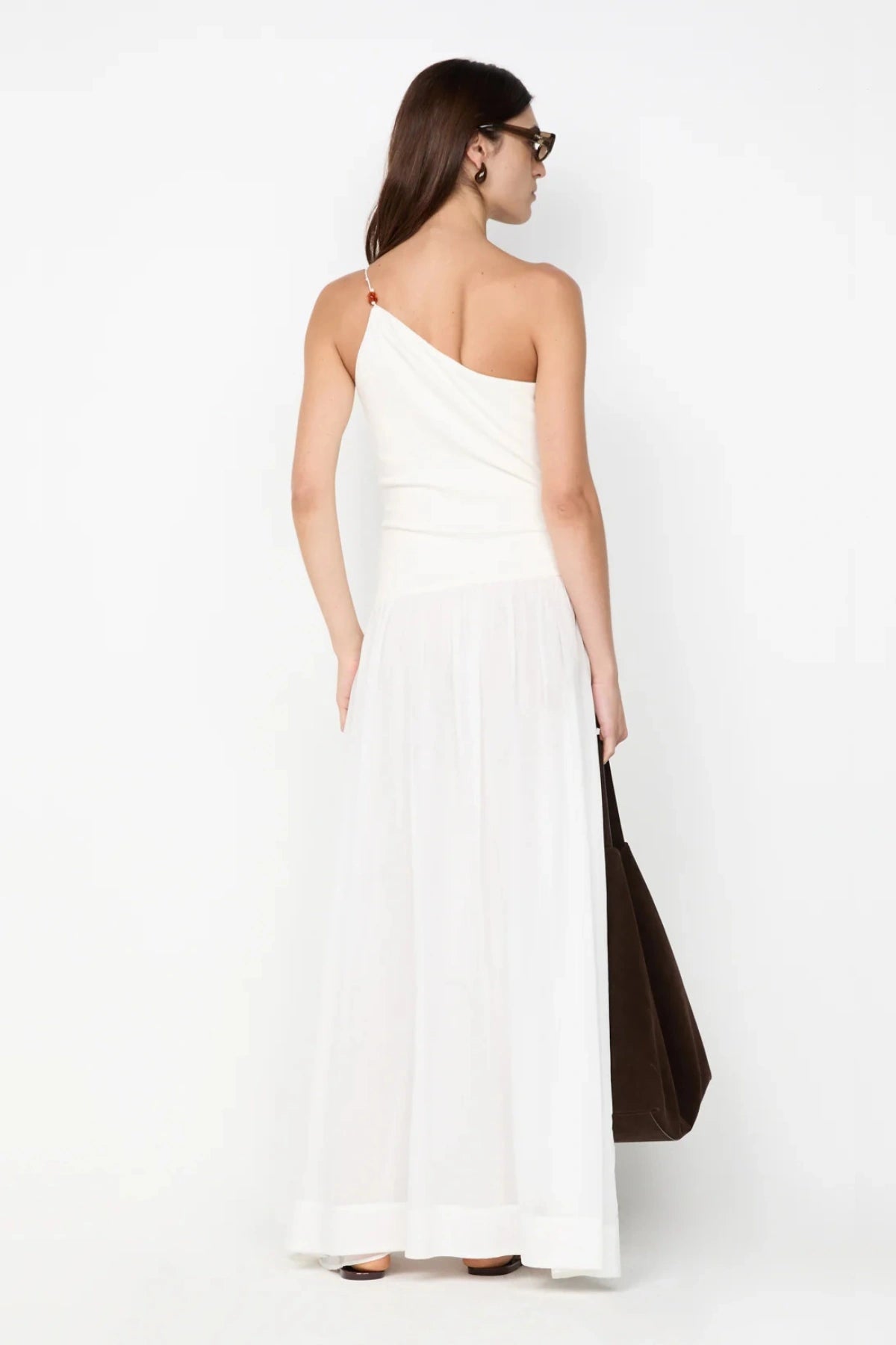 Sabrine Asym Maxi Dress by Bec + Bridge, ivory maxi with amber bead strap and ribbed bodice. Perfect for bridal or summer escapes.