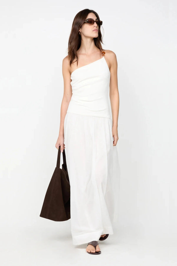 Sabrine Asym Maxi Dress by Bec + Bridge, ivory maxi with amber bead strap and ribbed bodice. Perfect for bridal or summer escapes.