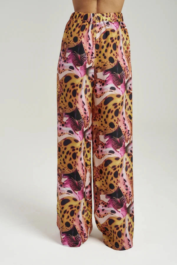 Sally Pant Orchid by Summi Summi – relaxed cupro blend pants with vibrant seasonal print for elevated summer styling.