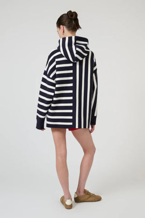 Salome Sweater in Navy Stripe by Onte, oversized souffle knit hoodie with directional stripe motif and drawstring detail.