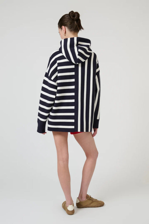 Salome Sweater in Navy Stripe by Onte, oversized souffle knit hoodie with directional stripe motif and drawstring detail.