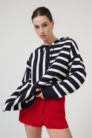Salome Sweater in Navy Stripe by Onte, oversized souffle knit hoodie with directional stripe motif and drawstring detail.