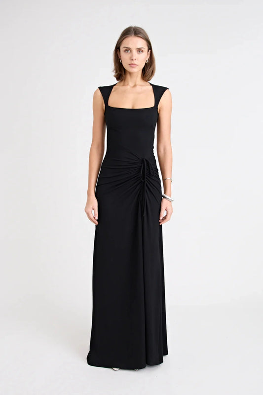 Samara Dress by Pfeiffer — a full-length jersey dress with a square neckline and adjustable front split, perfect for elegant occasions.