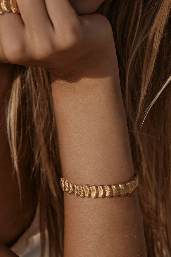 Samira Bracelet by Amber Sceats – sculptural 24k gold plated bracelet with textured fan detailing.