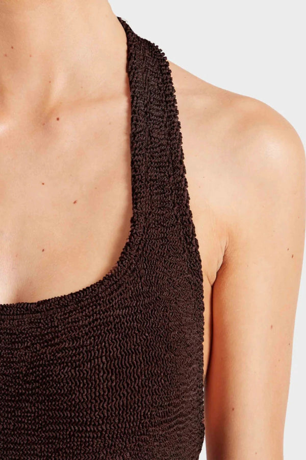 Sandy Swim by Hunza G, shimmering halter swimsuit in metallic crinkle fabric that stretches to flatter every curve.