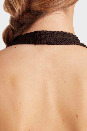 Sandy Swim by Hunza G, shimmering halter swimsuit in metallic crinkle fabric that stretches to flatter every curve.