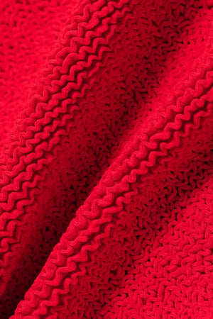 Sandy Swim in Red by Hunza G, halterneck one-piece in sculpting seersucker crinkle fabric. Timeless, flattering, and vacation-ready.
