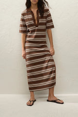 Santiago Polo Dress in Ombre Stripe Macro Carob by Faithfull the Brand, a relaxed knit midi with collar neckline, side splits, and chocolate stripe finish.