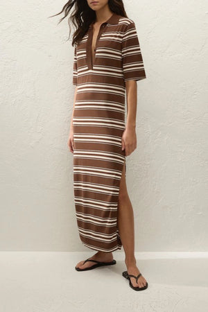 Santiago Polo Dress in Ombre Stripe Macro Carob by Faithfull the Brand, a relaxed knit midi with collar neckline, side splits, and chocolate stripe finish.