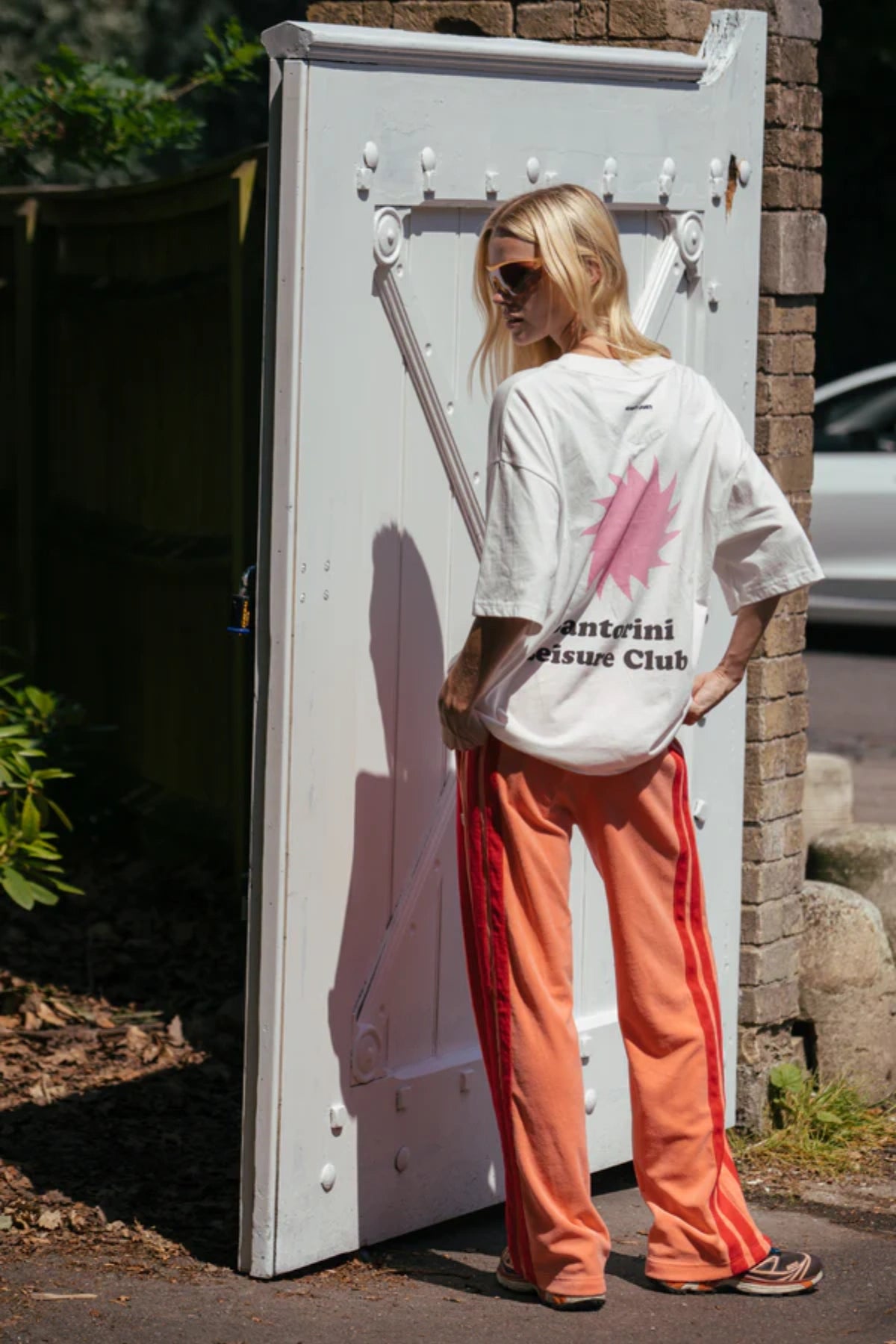 Santorini Oversized Tee in Warm White by Araminta James, relaxed cotton tee with crew neckline and graphic print, perfect for effortless everyday styling with wide-leg pants.