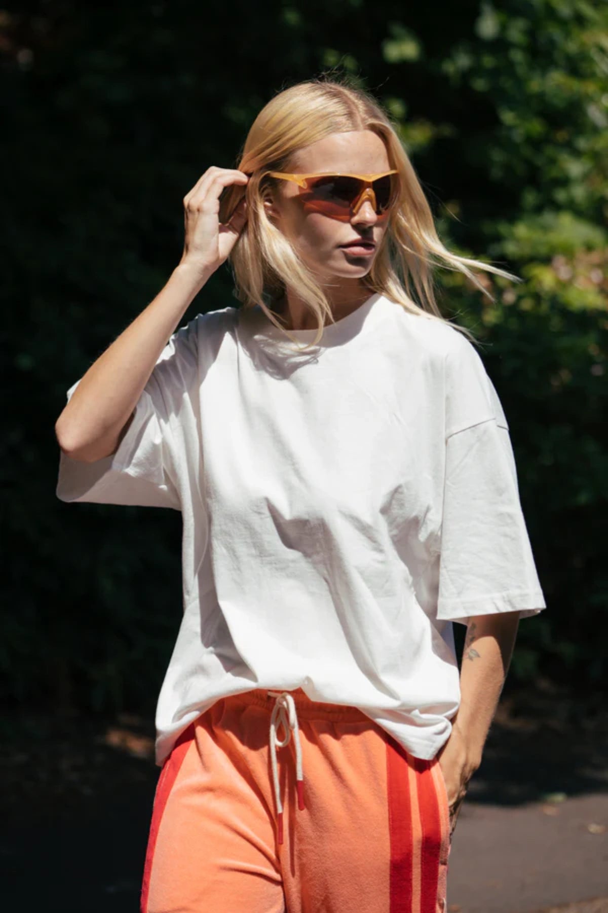Santorini Oversized Tee in Warm White by Araminta James, relaxed cotton tee with crew neckline and graphic print, perfect for effortless everyday styling with wide-leg pants.