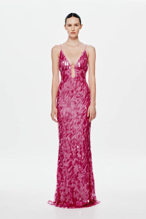 Sapphire Sequin Maxi Dress by Misha, a fuchsia pink gown with plunging cut-out neckline, low back, and voluminous hem. Perfect for events.
