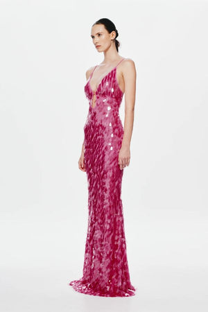 Sapphire Sequin Maxi Dress by Misha, a fuchsia pink gown with plunging cut-out neckline, low back, and voluminous hem. Perfect for events.
