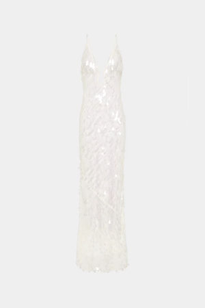 Sapphire Sequin Maxi Dress in Ivory by Misha, stunning body-con silhouette with plunging V-neckline, bust cut-out, and voluminous hem, perfect for making a dramatic entrance at evening events.