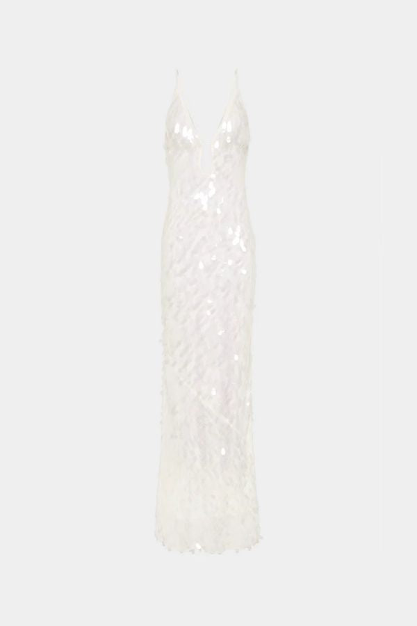 Sapphire Sequin Maxi Dress in Ivory by Misha, stunning body-con silhouette with plunging V-neckline, bust cut-out, and voluminous hem, perfect for making a dramatic entrance at evening events.
