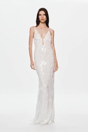 Sapphire Sequin Maxi Dress in Ivory by Misha, stunning body-con silhouette with plunging V-neckline, bust cut-out, and voluminous hem, perfect for making a dramatic entrance at evening events.