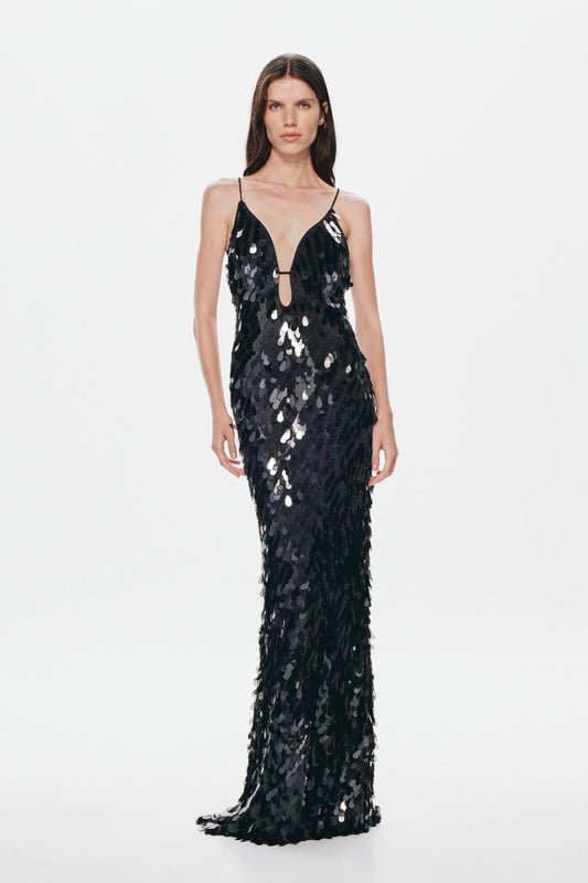 Sapphire Sequin Maxi Dress in Black by Misha, featuring a plunging neckline, low back, and shimmering sequin finish for elegant evening wear.