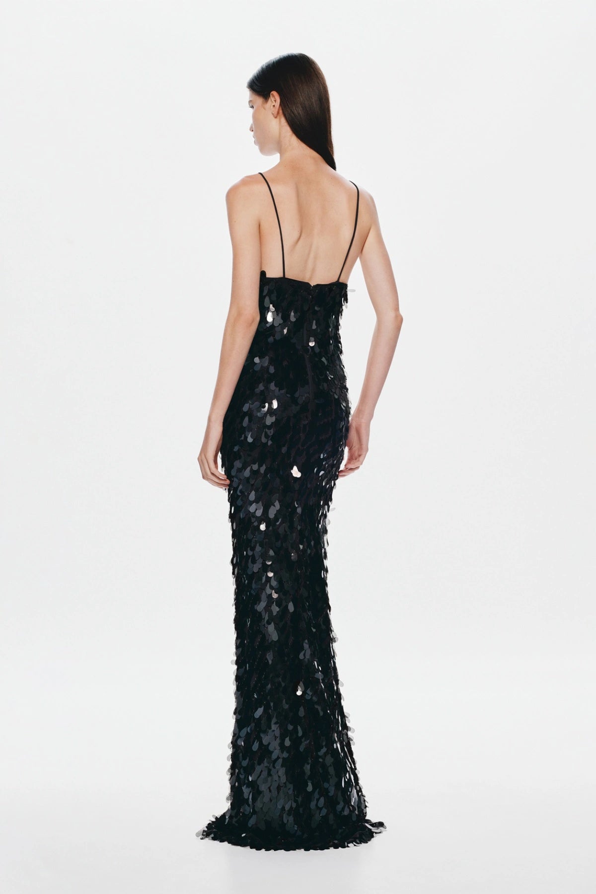 Sapphire Sequin Maxi Dress in Black by Misha, featuring a plunging neckline, low back, and shimmering sequin finish for elegant evening wear.