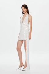 Sapphire Sequin Mini Dress by Misha, an ivory asymmetric mini with plunging neckline, wrap sash detail, and full sequins for radiant allure. (