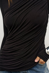 Saria Top Shadow by Bayse – long sleeve ruched top with boat neckline and asymmetric draped silhouette.