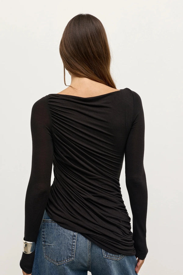 Saria Top Shadow by Bayse – long sleeve ruched top with boat neckline and asymmetric draped silhouette.