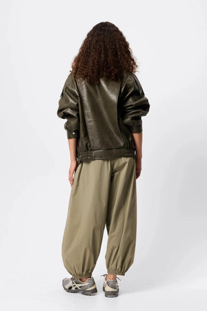 Saxon Oversized Bomber Olive by Mossman - oversized faux leather bomber jacket with double collar and epaulettes for elevated utilitarian style.