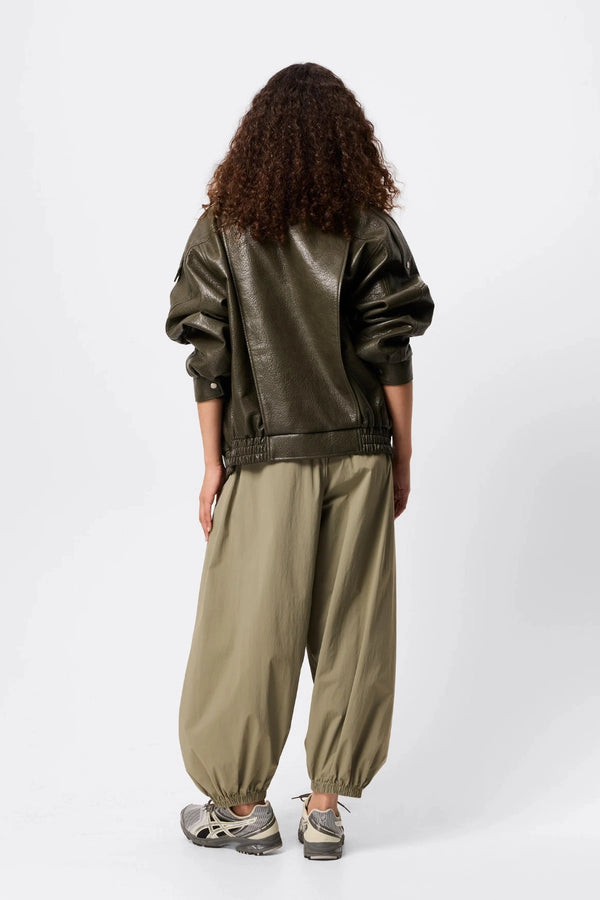 Saxon Oversized Bomber Olive by Mossman - oversized faux leather bomber jacket with double collar and epaulettes for elevated utilitarian style.