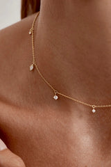 Scattered Light Choker by By Charlotte – 18k gold vermeil choker with cubic zirconia pendants on fine chain.