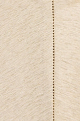 Ines Fringe Dress Oatmeal by Faithfull the Brand – Sheer linen mini with macrame hem, fringe skirt, and batwing sleeves.