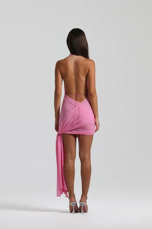 Anastasia Mini Candy Pink by Natalie Rolt – A versatile, trendy mini dress with flowing Georgette fabric, adjustable halter neck, and dramatic open back, perfect for elegant evenings or chic daytime events.