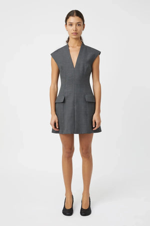 Seidler Mini Dress Dark Charcoal by Camilla and Marc – Trendy wool mini with deep V-neckline, front box pleat, and side pockets, perfect for refined daywear and polished evening looks.