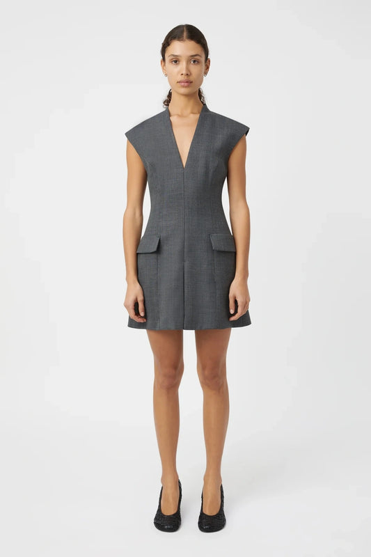 Seidler Mini Dress Dark Charcoal by Camilla and Marc – Trendy wool mini with deep V-neckline, front box pleat, and side pockets, perfect for refined daywear and polished evening looks.
