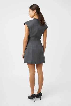 Seidler Mini Dress Dark Charcoal by Camilla and Marc – Trendy wool mini with deep V-neckline, front box pleat, and side pockets, perfect for refined daywear and polished evening looks.