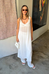 Sheer Pant White by Sneaky Link, sheer viscose trousers with elastic waist and fluid straight leg, perfect for trendy layering or vacation looks.