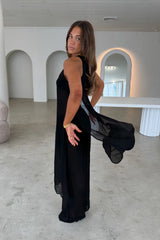 Sheer Pant Black by Sneaky Link – a fluid sheer pant with elastic waist and straight leg. Perfect for bold, modern styling.
