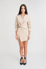 Shop the Zena Twist Dress Beige by Pfeiffer at Girls with Gems. A pinstripe shirt dress with signature twists, waist tucks.