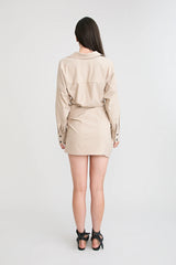 Shop the Zena Twist Dress Beige by Pfeiffer at Girls with Gems. A pinstripe shirt dress with signature twists, waist tucks.