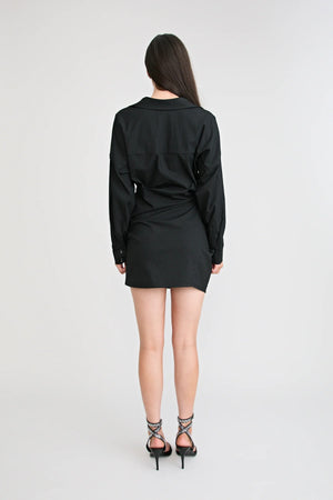 Shop the Zena Twist Dress Black by Pfeiffer at Girls with Gems. A pinstripe shirt dress with signature twists, waist tucks, and an asymmetric hem.