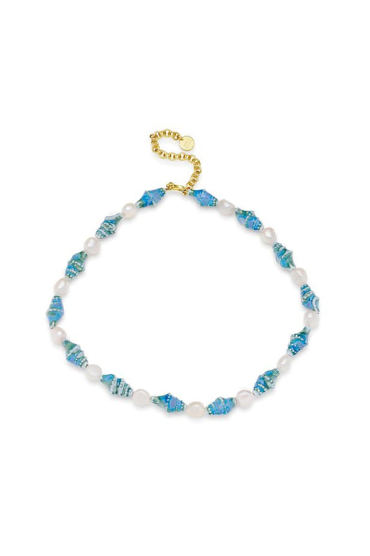 Siena Necklace by Amber Sceats – handcrafted in Italy with 24K gold plating, ceramic shells, and freshwater pearls for refined coastal elegance.
